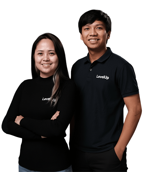 Two LevelUp team members standing side by side, representing long-term partnership and ongoing support