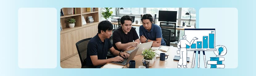 Offshore marketing team working together in an office environment while collaborating on shared digital tools.