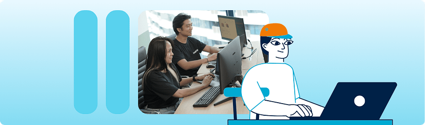 Better setup for remote work productivity Two team members working at desks beside a laptop illustration, representing clearer role setup for stronger remote work productivity
