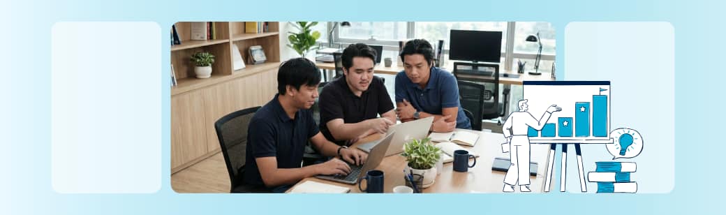 Offshore marketing team working together in an office environment while collaborating on shared digital tools.