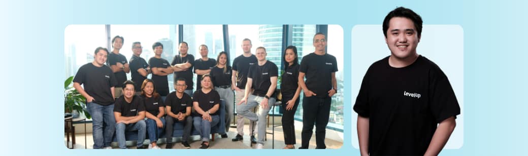 Group photo of LevelUp team members with a portrait of John Carlo