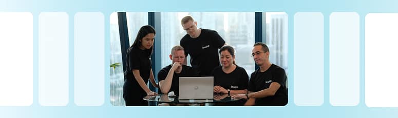 LevelUp Team Collaborating LevelUp team gathered, reflecting on business growth and collaboration since adopting EOS.