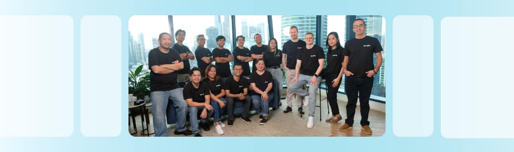 LevelUp team in matching black shirts, showcasing unity and growth after successfully implementing EOS.