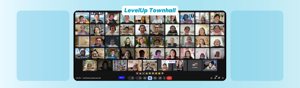Screenshot of a large virtual meeting with LevelUp team members visible in individual video tiles during an online town hall session.
